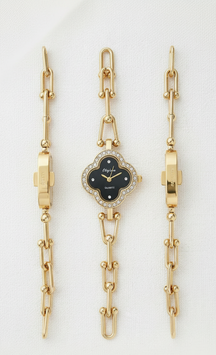 A gold-tone watch with a clover-shaped dial, shown alongside two matching gold-tone link bracelets. The watch dial is black with a small diamond-encrusted border and the Cartier logo.