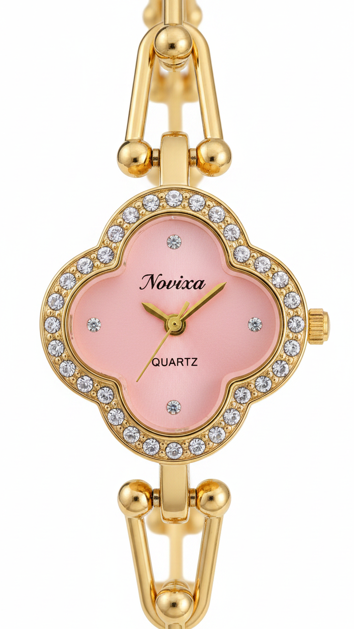 Gold-tone women's bracelet watch with a pink clover-shaped dial, crystal-embellished bezel, and matching gold-tone link bracelet on a white background.