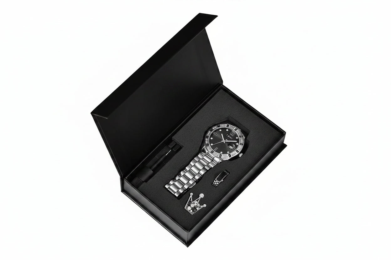 Black watch and pen set in a branded box on a white background